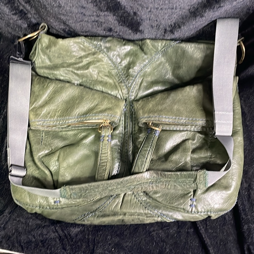 49 Square Miles Leather Hobo bag in green with purple stitching.